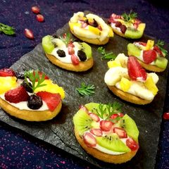 A picture of Biscuit mini fruit pizza.
