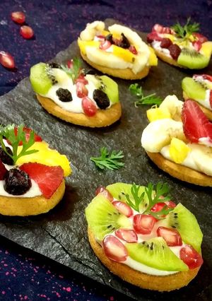 A picture of Biscuit mini fruit pizza.