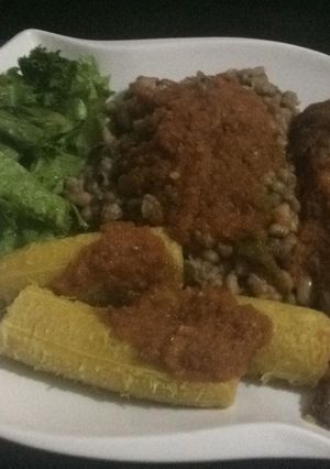 A picture of Boil plantain and beans with fish.