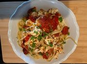 Une photo de spaghetti en tomate