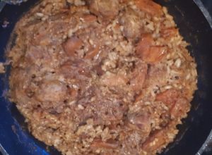 Foto principal de Arroz pipián rojo con cerdo y calabaza