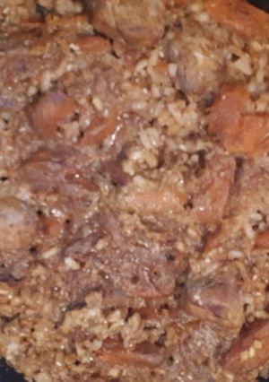 Foto principal de Arroz pipián rojo con cerdo y calabaza