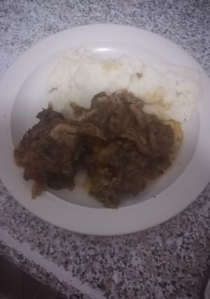 A picture of Pap and beef bones with cabbage.