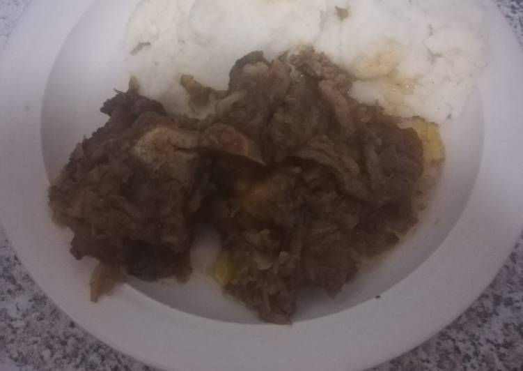 Pap and beef bones with cabbage