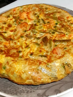 Una foto de Tortilla de menestra y mozzarella