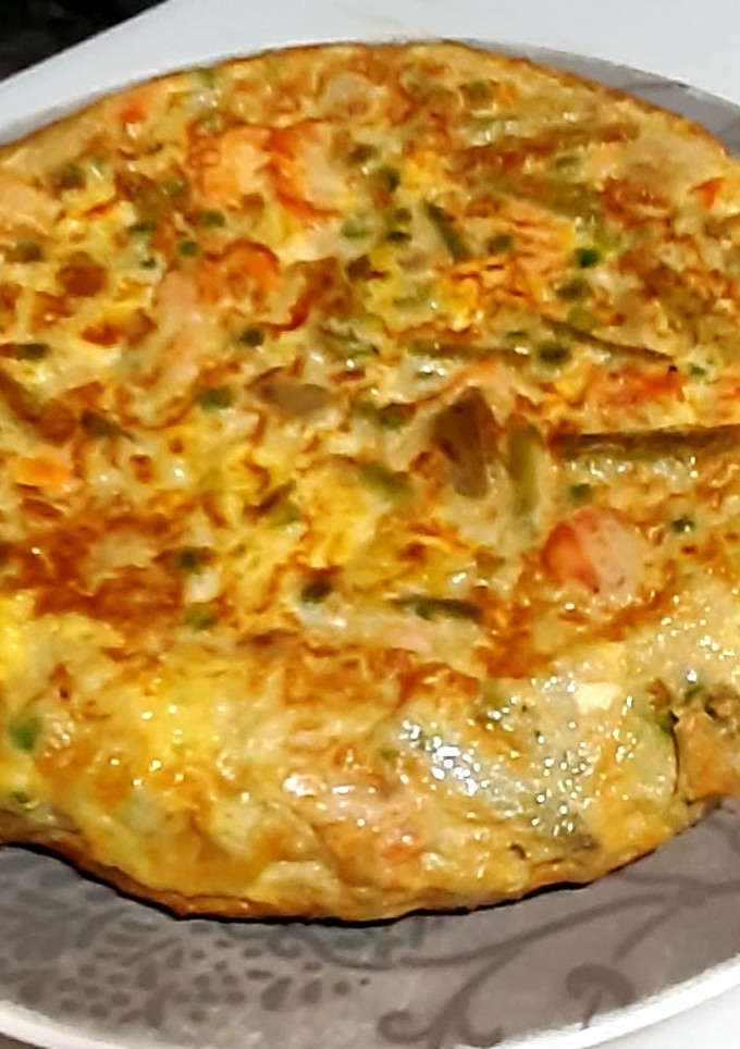 Una foto de Tortilla de menestra y mozzarella