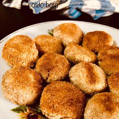 Narkol posto bora/ coconut poppyseed fritters A picture of Narkol posto bora/ coconut poppyseed fritters.