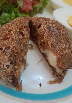 Una foto de Medallones de vegetales rellenos de muzarella 🧀🍆🌶