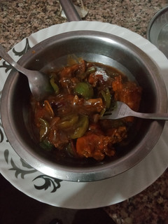A picture of Gravy Chicken Chili Chinese food.