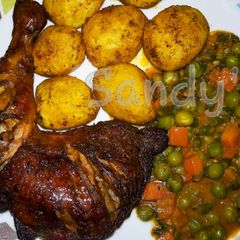 A picture of Baked chicken,creamy veggies & Bombay potatoes.