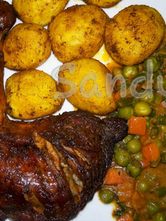A picture of Baked chicken,creamy veggies & Bombay potatoes.