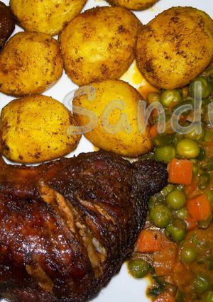A picture of Baked chicken,creamy veggies & Bombay potatoes.