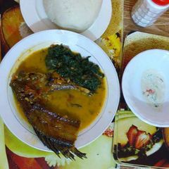 A picture of Fish stew and sukuma wiki.