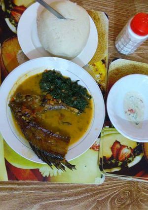 A picture of Fish stew and sukuma wiki.