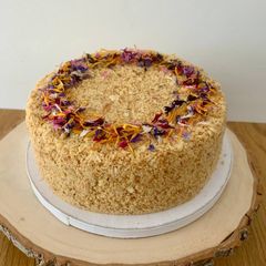 A picture of Napoleon cake with crème anglaise and white chocolate cream.
