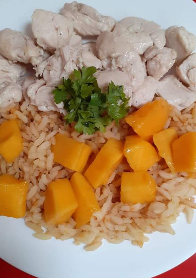 Una foto de Pollo con arroz y mango