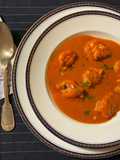 Tomato stew with dumplings
