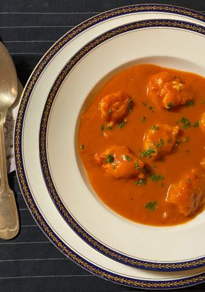 Une photo de Tomato stew with dumplings