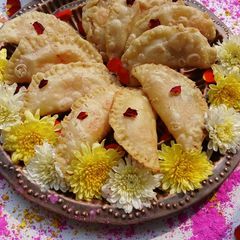 A picture of Holi Special Khoya Stuffed Gujiya.