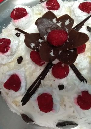 A picture of White forest cake#mycreativewhiteforestrecp.chocolate flower.