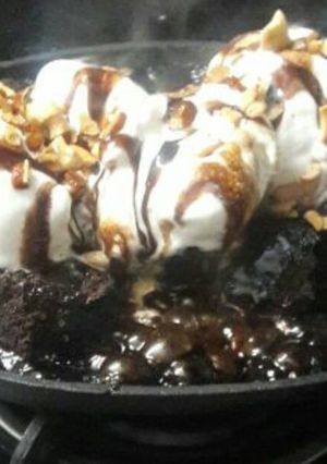 A picture of Fudgy chocolate sizzling brownie with icecream...😋😋😋😋.