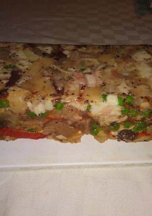 Una foto de Terrina de cabeza de cerdo lengua y morcillas
