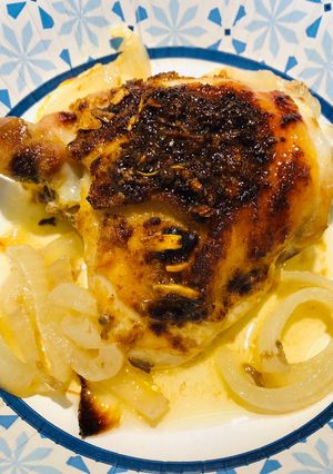A picture of Beer 🍺 and Onion 🧅 Chicken 🍗 Thighs.