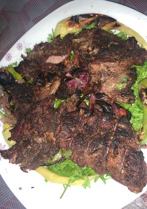 A picture of Grilled Beef on Charcoal.