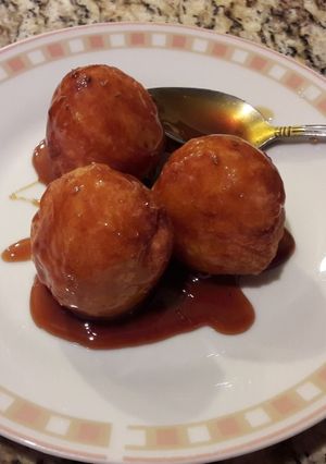 A picture of Cassava Fritters in Brown Sugar and Anise Syrup.