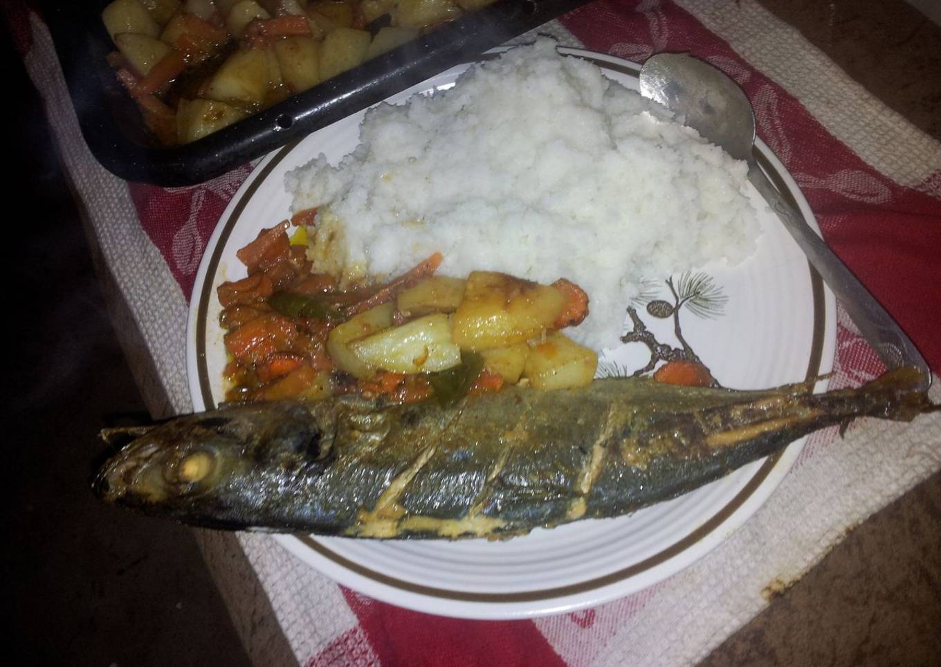 Potatoes veggies and grilled carapau