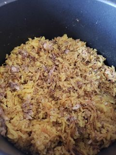 A picture of Rice with shredded fish 🐟.
