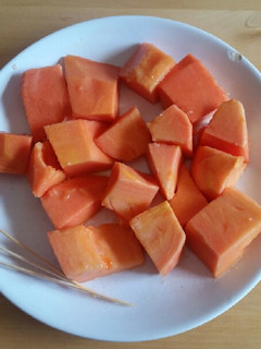 Una foto de Papaya con jengibre