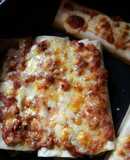 Canelones de carne y huevo fáciles bañados en salsa boloñesa