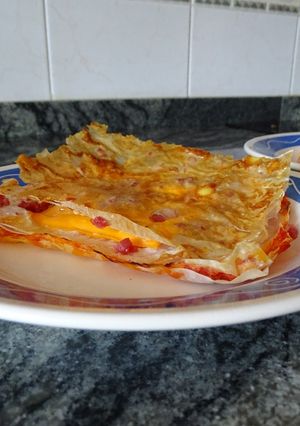 Una foto de Masa filo con pavo, queso y jamón