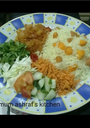A picture of Carrot rice wit sauce.