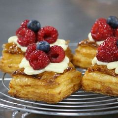 A picture of Crispy puff pastry filled with creme patisserie and fresh fruits.