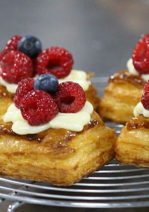 A picture of Crispy puff pastry filled with creme patisserie and fresh fruits.