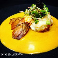 A picture of Lobster with Burmese curry.