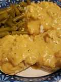 Chicken gravy over biscuits with green beans