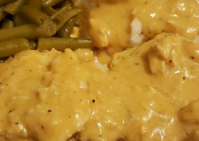 Simple Way to Prepare Super Quick Homemade Chicken gravy over biscuits with green beans