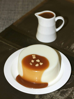 A picture of Panna Cotta With Butterscotch Sauce.