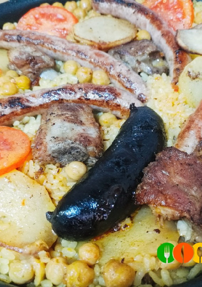 Una foto de Arroz al horno valenciano con pasas