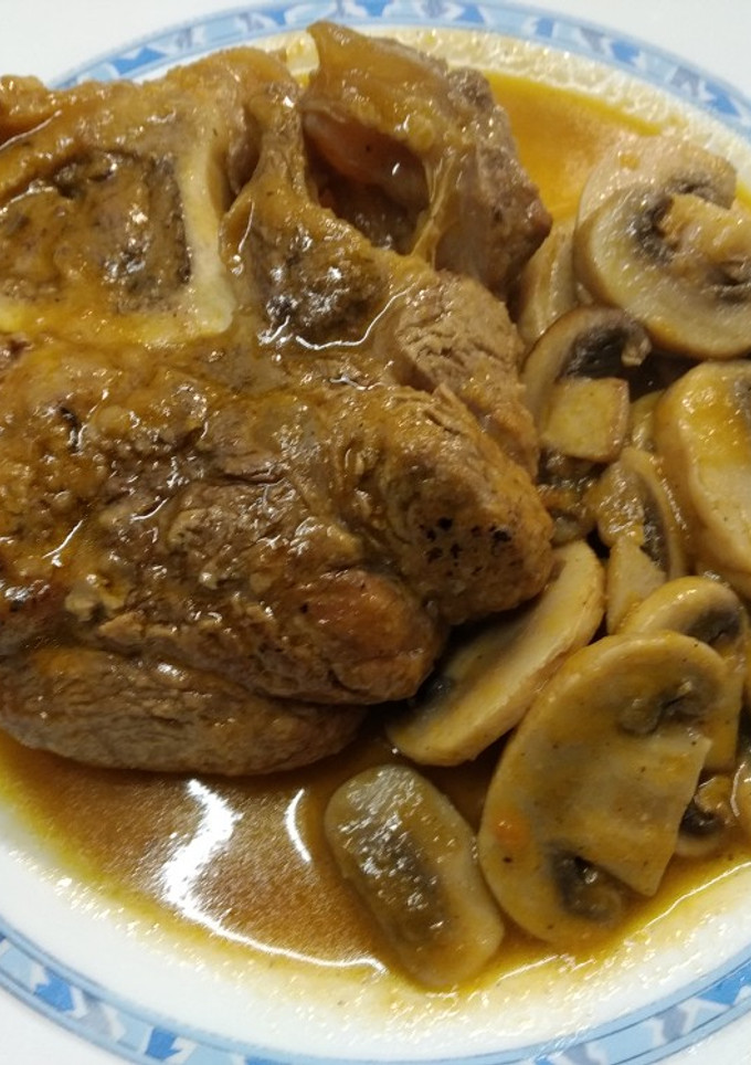 Una foto de Ossobuco de ternera con champiñones