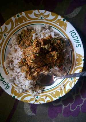 A picture of Rice,beans and egusi soup.
