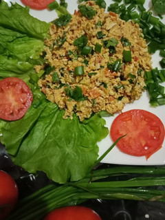 A picture of Eggs with veggies.