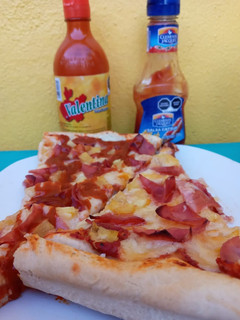 Una foto de Pizza Hawaiana