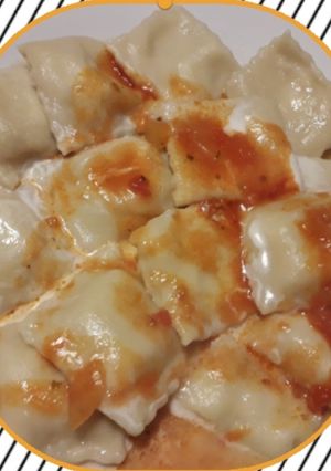 Una foto de Ravioles de queso y cebolla 😋