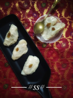 A picture of "Puli Pitha" #Cookpad.