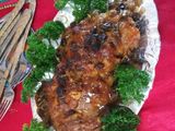 Lomo de cerdo con salsa de mango y uvas pasas