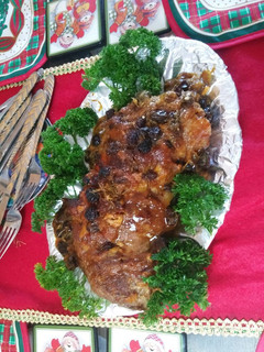 Una foto de Lomo de cerdo con salsa de mango y uvas pasas